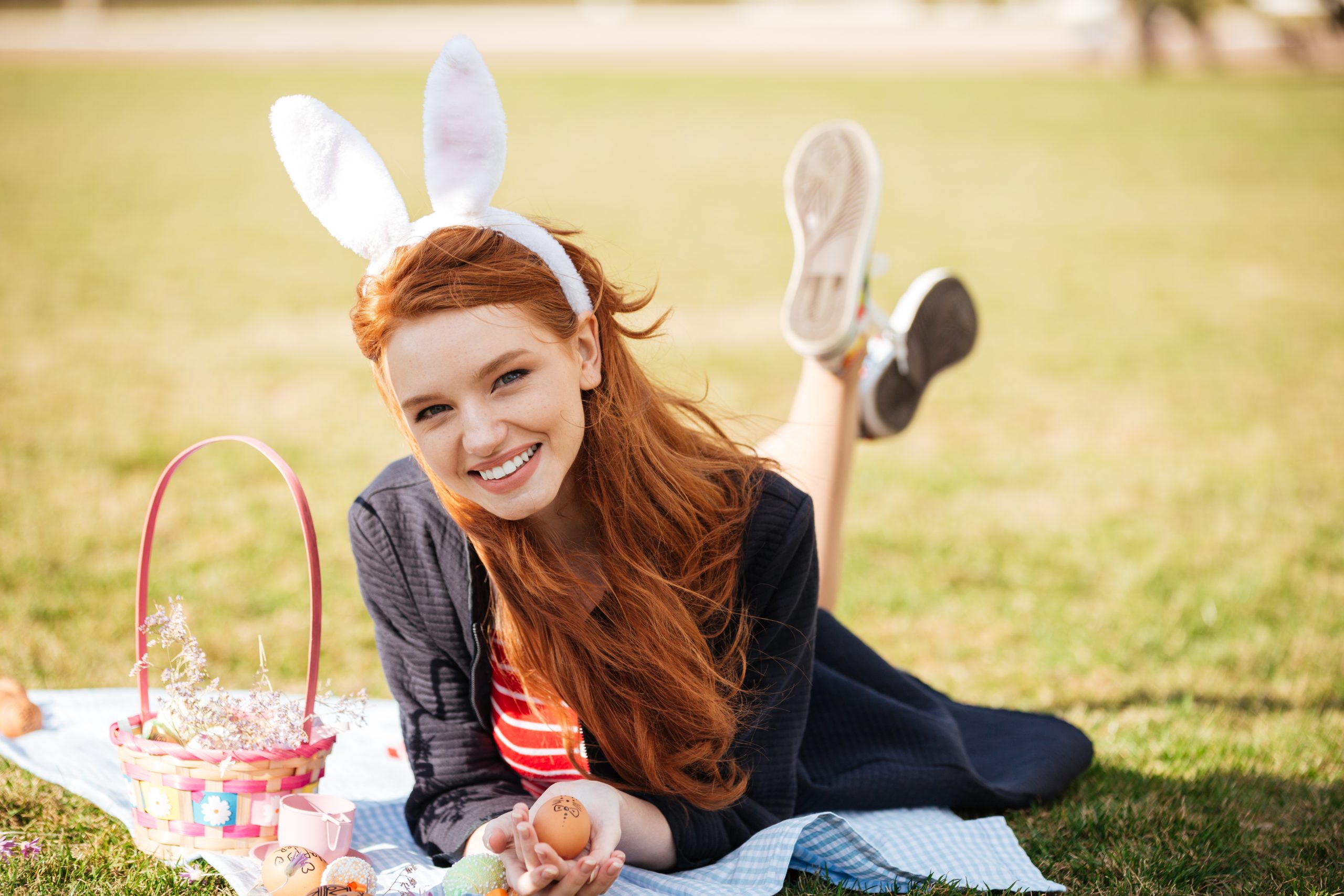 Portrait of a smiling happy red head girl